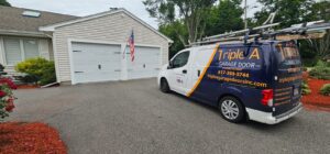Triple A Garage Doors van parked at customer’s home for garage door installation